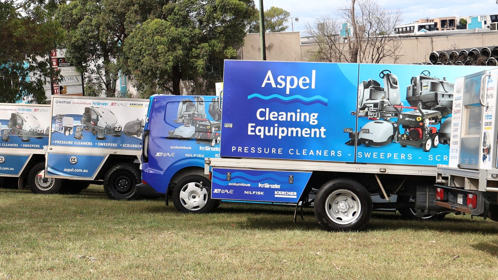 Aspel's branded service vehicles lined up outside the Penrith depot.