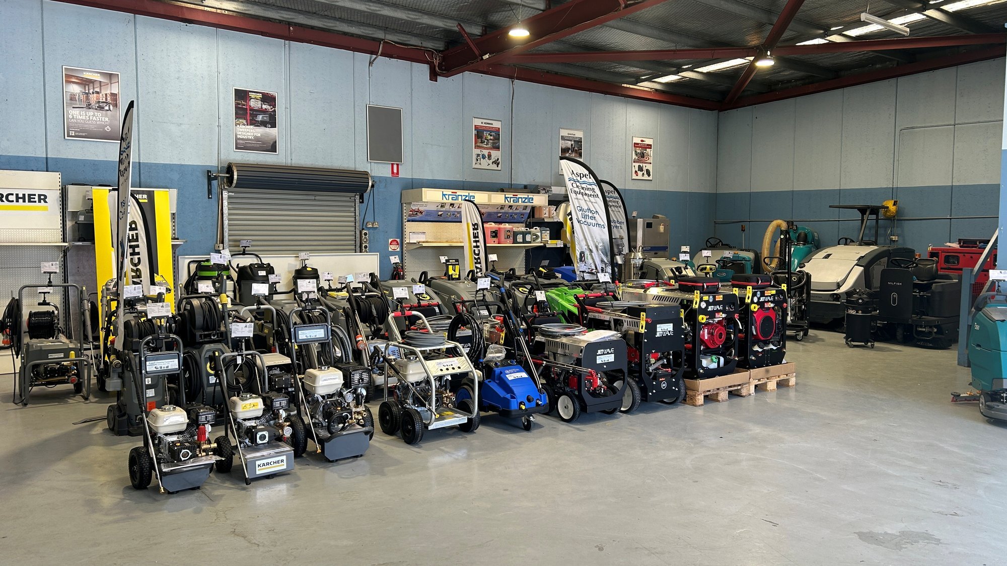 Pressure cleaners and floor cleaning machines on display in Aspel's Penrith showroom.