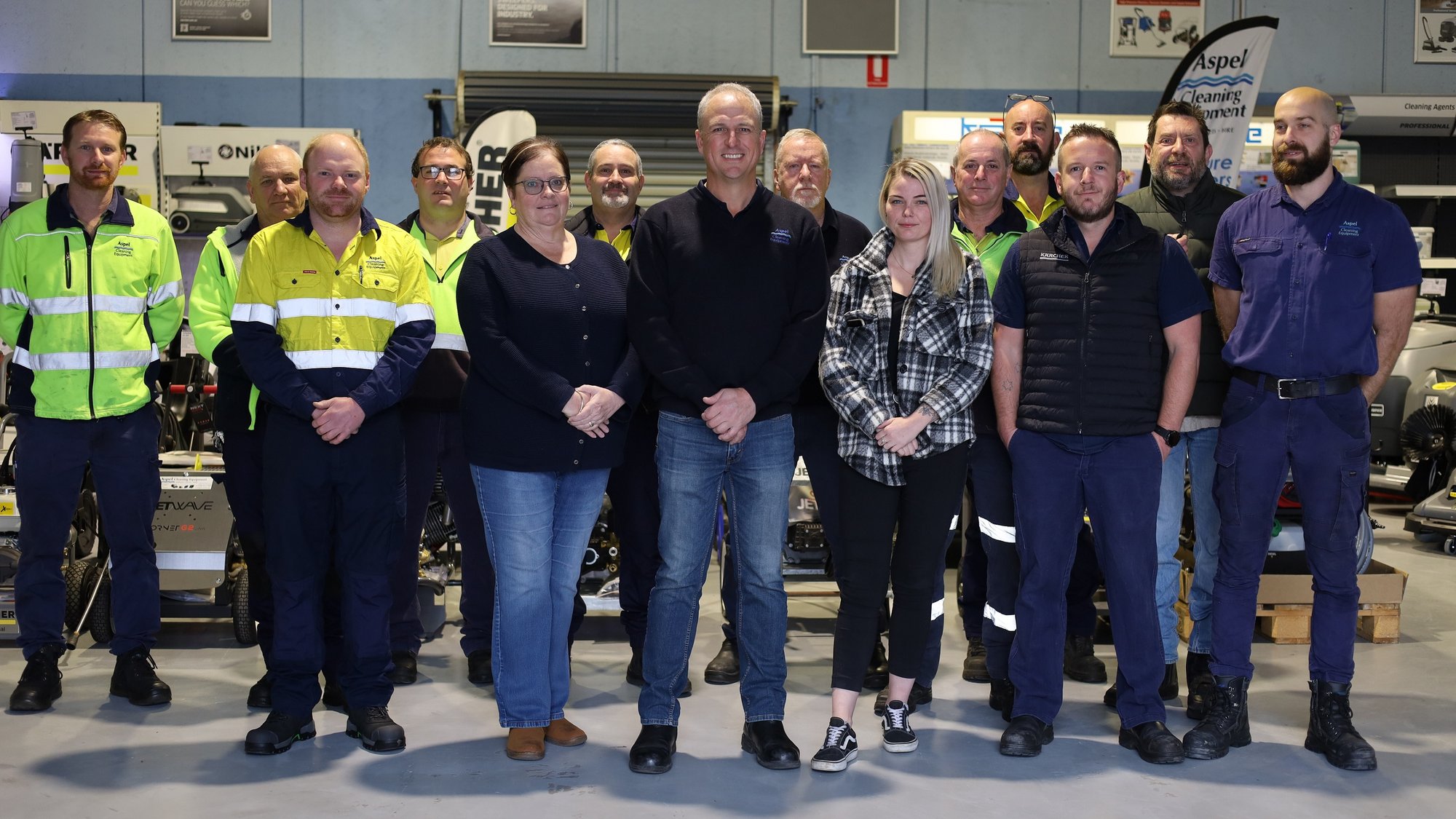The Aspel Cleaning Equipment team in the Penrith warehouse showroom.